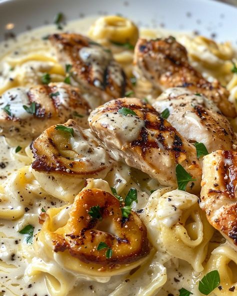 Craving a comforting yet sophisticated meal that's bound to impress? Look no further than this Asiago Tortellini Alfredo with Grilled Chicken recipe. Asiago Tortellini With Grilled Chicken, Chicken With Tortellini Recipes, Asiago Tortellini Chicken Alfredo, Chicken And Tortellini Recipes, Chicken Tortellini Recipes, Asiago Tortellini, Chicken Alfredo Tortellini, Asiago Chicken, Tortellini Alfredo