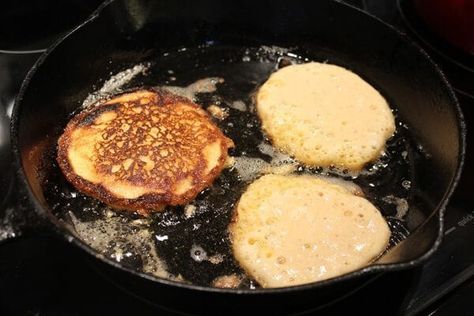 Fried Cornbread Cakes in a cast iron skillet Cornbread Patties, Cornbread Cake Recipe, Cornbread Cakes, Cornbread Recipe From Scratch, Fried Cornbread, Cornbread Cake, Johnny Cakes, Skillet Cornbread, Johnny Cake