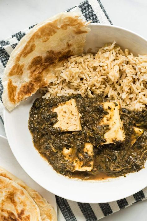 You will be shocked how easy it is to make this Spinach Saag Paneer at home in your slow cooker. Make it with fresh paneer cheese or tofu. #dinner #freezerfriendly #holiday #makeahead Crockpot Indian Recipes, Crock Pot Dump, Shrimp Thai, Go To Dinners, Tofu Dinner, Indian Spinach, Saag Recipe, Slow Cooker Meat, Vegetarian Slow Cooker