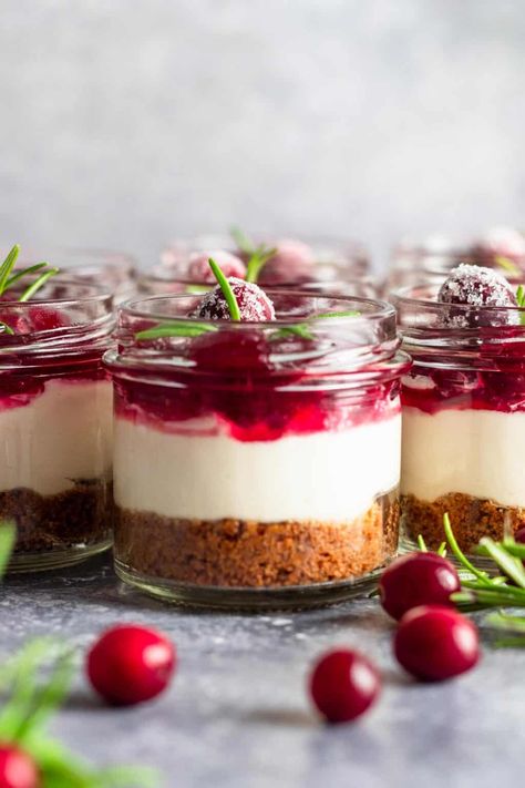 Perfect for holiday gatherings, these No Bake Cranberry Cheesecake Jars feature a golden brown cookie crumb crust, easy cranberry jam layer, and creamy vanilla cheesecake. Made in individual cups or jars and without baking are the perfect quick treat. No Bake Cranberry Cheesecake, Cabbage Bake, Cookie Crumb Crust, Cheesecake Jars, Crumb Crust, Cranberry Dessert, Cranberry Cheesecake, Christmas Cheesecake, Delicious Christmas Desserts