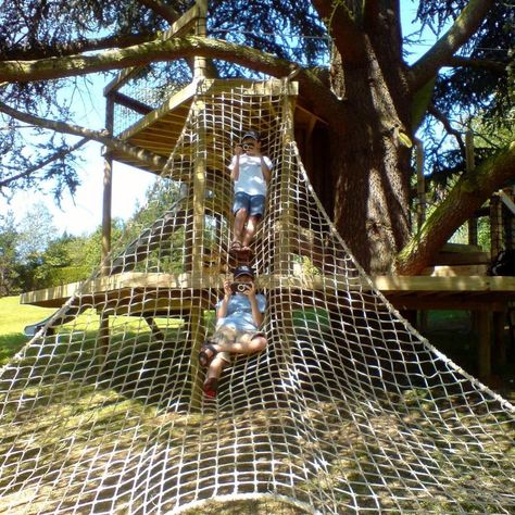 Scramble Cargo Nets for treehouses — Treehouses, Rope Bridges, Treetop Walkways and Nest Swings Cargo Net Playground, Tree Net Hangout, Tree Webbing, Net Seating, Treehouse Playground, Rope Playground, Natural Outdoor Playground, Tree Net, Tree Deck