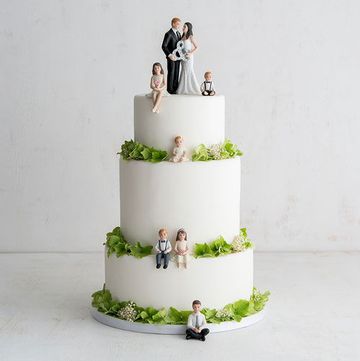 When a wedding is bringing together more than just the bride and groom, why not reflect all involved in the cake toppers? Set your sons and daughters on the fondant-covered tiers in the form of these toppers from Little Things Favors that can be personalized by age, hair color, and eye color. Or opt for a modern look with a handmade acrylic family silhouette topper by TrueLoveAffair on Etsy that can be turned into a keepsake display. Family Wedding Cake Toppers, Cake Topper Wedding Couple, Baby Boy Cake Topper, Blended Family Wedding, Porcelain Wedding, Family Cake, Baby Boy Cakes, Cakes For Boys, Perfect Cake