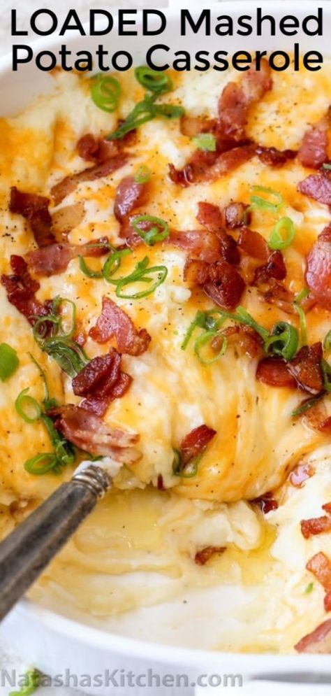 Loaded Mashed Potato Casserole is the perfect side dish. These irresistibly creamy baked mashed potatoes are loaded with cheese and topped with crispy bacon. #loadedpotatoes #loadedbakedpotatoes #potatocasserole #loadedmashedpotatoes #potatoes #natashaskitchen Make Ahead Loaded Mashed Potato Casserole, Baked Mash Potatoes In The Oven, Creamy Oven Baked Mashed Potatoes, Double Mashed Potatoes Recipe, Baked Mashed Potatoes Recipe Ovens, Oven Baked Mashed Potatoes Recipe, Pre Made Mashed Potatoes, Mashed Potato Recipes Best, Elevated Mashed Potatoes