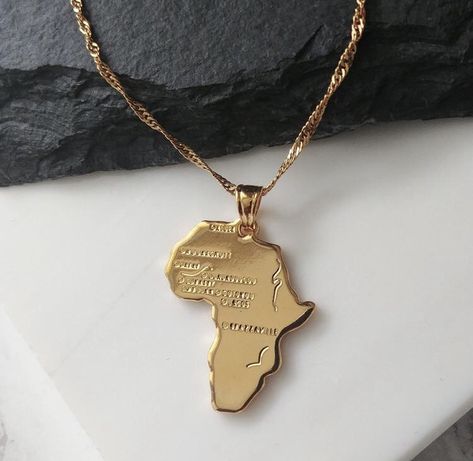 This is the map of Africa, a symbol of strength, love, and life. Encarved on the map is popular locations in Africa such as Dakar, Oalger, and Oabdjan ✨🌍 Africa Pendant, Countries In Africa, Africa Necklace, Dope Jewelry Accessories, African Map, Country Jewelry, Map Pendant, African Earrings, Map Necklace