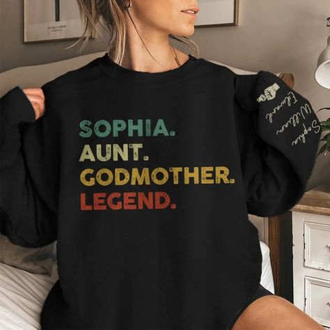 Aunt, Godmother, Legend - Family Personalized Custom Unisex Sweatshirt With Design On Sleeve - Gift For Family Members Unisex Style Casualteetrends. One multipurpose item of clothing for the upper body is a shirt. It is a wardrobe must since it is available in a variety of designs, materials, and hues. A shirt usually features sleeves, a collar, and buttons along the front, although there are many variations to fit various events and tastes. Whether you're dressing for a formal occasion or going casual for a day out, a shirt is a great way to show off your sense of style while being cozy. #family #personalized #Shirt #Casualteetrends