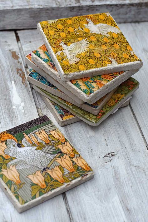 A stack of DIY tile coasters. These are so easy to make and the wonderful art nouveau patterns are free to print. 12 different designs to choose from. Hand Painted Tiles Diy, Diy Tile Coasters, How To Make Tiles, Tile Art Projects, Art Nouveau Design Pattern, Leftover Tile, Diy Coasters Tile, Coaster Ideas, Tile Artwork