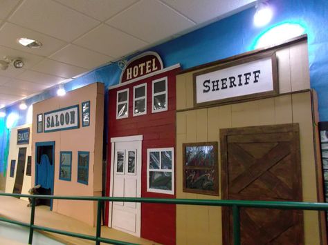 Our small western town has a few store fronts! Western General Store Ideas, Diy Cardboard Western Town, Wild West Hallway Decorations, Western Hallway Decor School, Wild West Train Station, Wild West Homecoming Theme, Western Theme Book Fair, Wild West Book Fair, Western Homecoming Theme