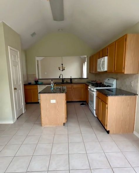 Empty kitchen before renovation. Bright Green Cabinets, Empty Kitchen, Vintage Outdoor Decor, Ikea Dining Table, Painting Oak Cabinets, White Tile Floor, Oak Kitchen Cabinets, Cabinet Paint Colors, Vintage Outdoor