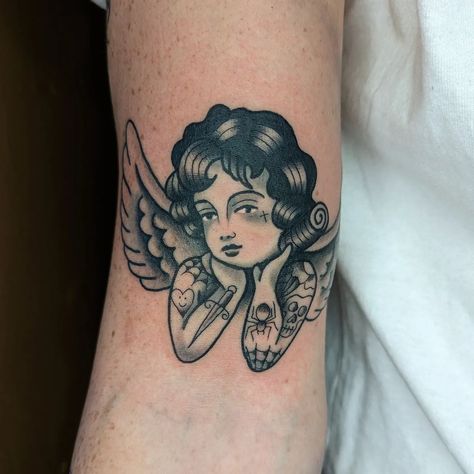 Leah Mitchell on Instagram: "Cherub! . . . #tattoo #tattoos #traditionaltattoo #traditionaltattoos #traditionalflash #trad #traditionalart #traditional #tradworkers #tradwork #blackwork #blackworktattoo #newcastle #oldschooltattoo" Cupid Tattoo, Temple Tattoo, Cherub Baby, Traditional Tattoo Inspiration, Cherub Tattoo, Tattoo Apprenticeship, Feminine Tattoo Sleeves, Traditional Tattoo Sleeve, Tattoo Apprentice