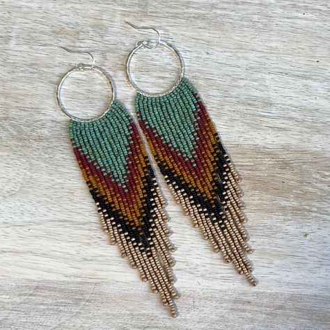 Ultra lightweight beaded fringe earrings, (made with tiny, size 15 seed beads) in turquoise, red, and yellow tones, suspended from sterling silver hoops. Details~ * Made with glass seed beads and sterling silver ear wires, suspended from sterling silver hoops. * Length: Drop length (including ear wire) is approximately 12 cm. Width is 2 1/2 cm.  * Packaging: Your order will arrive lovingly packaged in a gift box, wrapped with a ribbon and ready for gifting. * Please visit my Etsy shop for a full selection of my handmade jewelry: https://www.etsy.com/shop/beadedgemsbycristina * Thanks so much for stopping by my shop and please let me know if you have any other questions, I am here and happy to help! Sterling Silver Fringe Earrings, Beaded Earrings Tutorials, Beaded Fringe Earrings, Bead Embroidery Patterns, Beaded Earrings Patterns, Earrings Turquoise, Earring Tutorial, Yellow Tones, Beading Projects