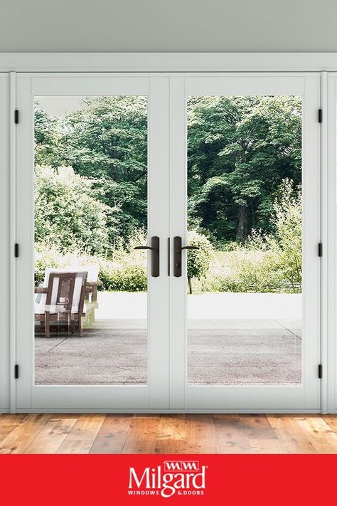 Looking for white framed patio doors? This modern vinyl glass doors perfect for any new construction or home remodel. Tuscany® Series shown. #patiodoorideas #frenchpatiodoors #patiodoormakeover Glass Sliding Patio Doors, Patio Doors With Windows On Each Side, Double Sliding Patio Doors, French Doors Patio Exterior, French Patio Doors, French Doors With Screens, Replacement Patio Doors, White French Doors, Sliding Doors Exterior