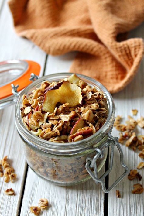 Warm spices, pecan bits and dried apple add a hint of seasonal flavor that will quickly make this Spiced Apple Pecan Granola your preferred fall snack! Fall Granola, Apple Granola, Pecan Granola, Coconut Protein, Spiced Pecans, Fall Snacks, Dried Apples, Granola Recipes, Spiced Apples