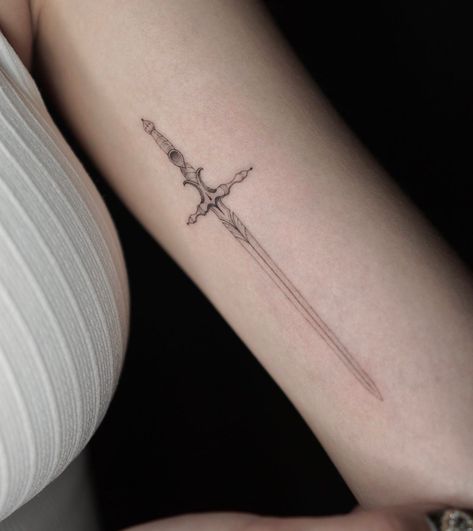 Dual Tattoo Ideas, Symmetrical Wrist Tattoo, Fantasy Minimalist Tattoo, Swords Tattoo, Three Of Swords Tattoo Dainty, Small Dagger Tattoo, Spear Tattoo, Spine Tattoos With Swords, Spine Dagger Tattoo