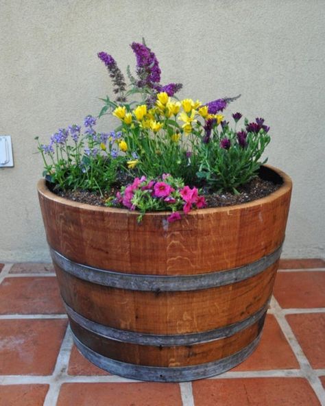 Basic Half-barrel planter with straight cut top. Free Drainage holes at you request. Dimensions: 16”H X 26” Diameter Approximately Eco Wine Furniture products are left with the manufacturers markings, which vary from piece to piece. In addition, a marking that may appear to be blemishes are Wine Barrel Garden, Whiskey Barrel Planter, Barrel Flowers, Wine Barrel Planter, Side Patio, Wine Furniture, Barrel Ideas, Backyard Bonfire, Outdoor Sanctuary