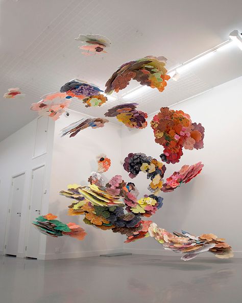 While Dutch artist Joris Kuipers spent years studying traditional painting and fine art techniques at both the Arnhem Academy and the Frank Mohr Institute in Groningen, his installations fly in the face of anything traditional. While borrowing from ideas rooted in expressionism as far as the applica Faerie House, Cloud Paintings, Flower Shop Design, Paper Installation, Peacock Wall Art, Bio Art, Flower Installation, Colossal Art, Flower Sculptures