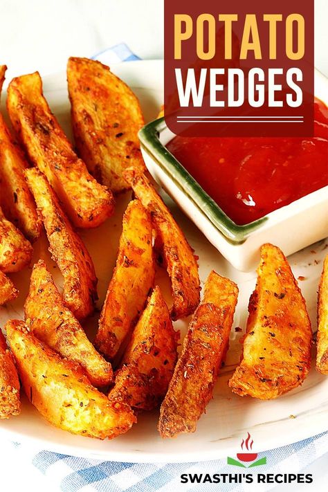 Potato wedges make for a great appetizer or a snack & are easy to make. These are delicious, crisp, flavorful and spicy. Potato wedges are a classic side made with wedges of potatoes and seasonings. Most often these are baked but can also be deep fried or air fried. Fried Potato Wedges, Best Indian Food Recipes, Spicy Potato Wedges, Street Food At Home, Indian Snacks Recipes, Bhindi Masala, Crispy Potato Wedges, Dahi Vada, Potato Wedges Recipe