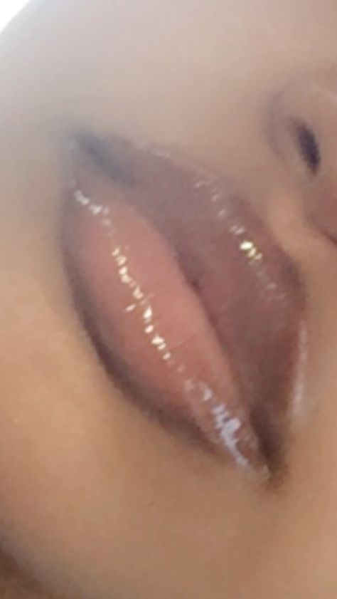 So I outlined my lips with a dark brown eyebrow pencil that I got from the dollar store. Cheap Of course. Then, put NYX intense butter gloss (in tres leches) and finally put lipgloss (Broadway rosehip oil lipgloss in the pic) but I sometimes use different glosses. Pretty sure these weren’t pricey either. Brown Outline Lips With Gloss, Brown Lips Aesthetic, Lip Gloss On Black Women, Dark Outlined Lips, Dark Brown Lipgloss, Brown Lip Liner With Clear Gloss, Brownie Drip Nyx Butter Gloss, Brown Outline Lips, Brown Lipliner With Gloss