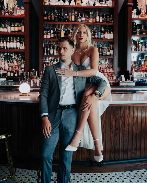 Spicy Engagement Photos Hotel, Pool Table Couple Photoshoot, Whiskey Engagement Photos, Hotel Lobby Couple Photoshoot, Couple Chair Poses, Couples Bar Photoshoot, Casino Engagement Photos, Restaurant Couple Photos, Fancy Couple Photoshoot