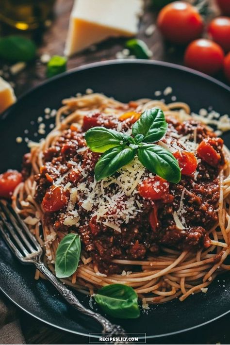 I absolutely love diving into a plate of this hearty spaghetti bolognese! The rich, meaty sauce combined with perfectly cooked pasta is a classic comfort food that warms the heart. Topped with fresh basil and a sprinkle of cheese, it's both simple and delightful. Perfect for family dinners or cozy nights in! Types Of Pasta Sauce, Bolognese Pasta, Spaghetti Bolognese Recipe, Delicious Spaghetti, Pasta Bolognese, Cooked Pasta, Bolognese Recipe, Bolognese Sauce, Spaghetti Bolognese