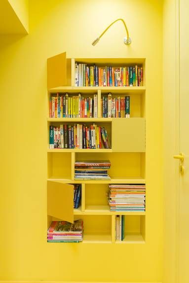 Recess Shelving, Yellow Shelves, Yellow Library, Cube Architecture, Colorful Apartment, Store Books, Yellow Interior, Book Storage, Yellow Art