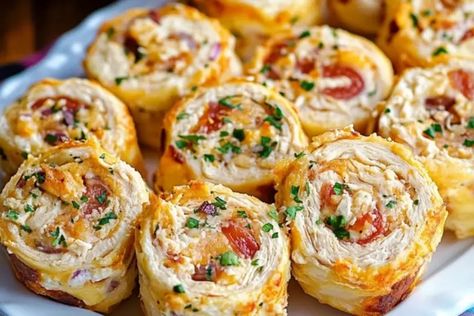 These Easy Crack Chicken Pinwheels are a crowd favorite, bursting with creamy cheese, ranch seasoning, crispy bacon, and tender chicken. Whether for a party, picnic, or quick snack, these bite-sized pinwheels deliver bold flavor in every bite. Serve them up for an effortless and irresistible treat! #Hashtags #CrackChickenPinwheels #ChickenPinwheels #EasyAppetizers #PartyFood #BiteSizedSnacks #RanchChicken #BaconLovers #PinwheelRecipe #QuickAndEasy Soft Tortillas, Chicken Pinwheels, Pork Seasoning, Pinwheel Appetizers, Leftover Rotisserie Chicken, Pinwheel Recipes, Best Party Food, Cream Cheese Chicken, Bowl Recipes