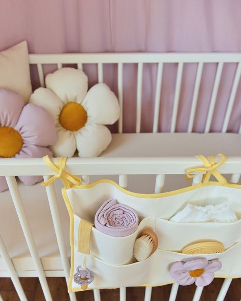 💛 Complete your floral-themed girl’s nursery with our beautiful #handmade DAISY DECOR PILLOW in calming lilac and white. This gentle hue is soothing to the eyes and is often used in spaces designed for tranquility. White daisies, with their whimsical charm and timeless appeal, symbolize innocence, purity and simplicity. Incorporating daisies into your decor brings a touch of sweetness and nostalgia, infusing any space with a sense of playfulness and light-heartedness. Add magic to any playroo... Purple And Yellow Nursery Girl, Purple And Yellow Nursery, Lavender Nursery Baby Girl, Sunny Nursery, Yellow Nursery Girl, Yellow Kids Rooms, Daisy Decor, Lavender Nursery, Nursery Baby Girl