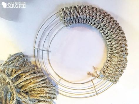 This week’s project — a DIY sisal rope woven wreath.  I spray painted it tan because I was going to weave some rope around it, and I knew parts of the frame would end up exposed. The weaving process was pretty straightforward: I went over one wire and under the next, then wrapped around the inside (and outside) wire to start over again. Diy Rope Design, Woven Wreath, Rope Wreath Diy, Metal Wreath Frame, Rope Diy, Funky Junk Interiors, Rope Wrapped, Sisal Rope, Wire Wreath