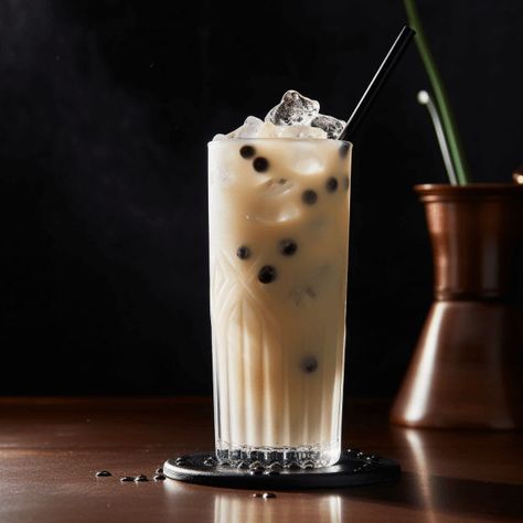 The Boba Cocktail offers a sweet and creamy taste with a hint of fruitiness from the liqueur. The chewy tapioca pearls add an interesting texture that makes this cocktail a unique drinking experience. Alcoholic Boba Drinks, Boba Cocktail, How To Make Boba, Types Of Vodka, Cocktail Recipes Whiskey, Creamy Cocktails, Vodka Brands, Boba Drink, Tea Cocktails