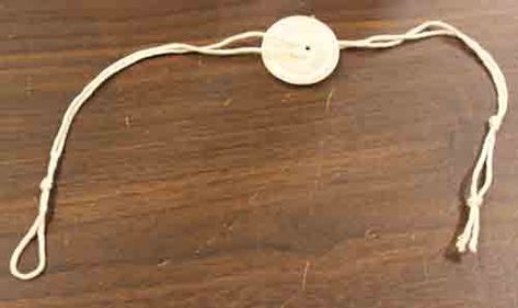 Learn how to make a spinning button toy (button thread spinner) by watching this video and reading the instructional tutorial. Pioneer Button Spinner, Lost Skills, Grandchildren Activities, Old Fashioned Toys, Pioneer Trek, Making Toys, Spool Knitting, Pinterest Crafts, Primary Activities