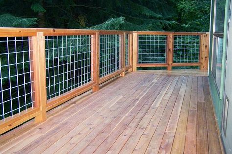 Cedar deck and hogwire rail Reling Design, Wire Deck Railing, Deck Railing Diy, Hog Wire Fence, Patio Railing, Deck Railing Design, Cattle Panels, Cedar Deck, Deck Designs Backyard