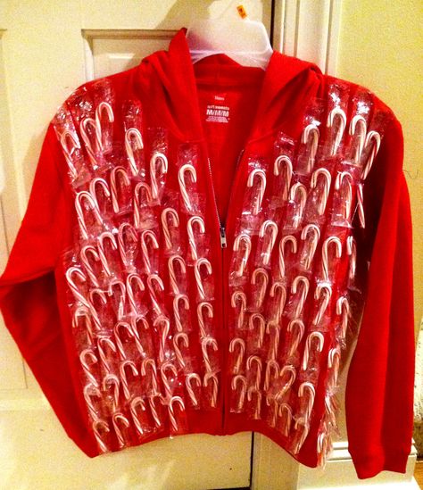 Make your own tacky Christmas sweater. Red sweater/hoody + candy canes + glue gun. HAHAHAHAHAHA Homemade Ugly Christmas Sweater, Ugly Christmas Sweater Diy Funny, Ugly Christmas Sweater Ideas, Diy Christmas Outfit, Ugg Sweater, Christmas Sweater Ideas, Ugly Christmas Sweater Outfit, Diy Christmas Sweater, Xmas Sweaters