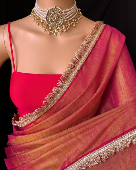 Pink gold tissue saree with contrast golden lace all over sarees. Comes with beautiful red thread tassels on pallu. Blouse: running blouse 80cm. To find this product in website: Www.thejacouture.in > Tissue sarees> pink Gold tissue saree. Jewellery collaboration: @anvi__jewellery #mettalictissuesaree #tissuesaree #trendingsaree #tissuelacesaree #traditional #pinktissuesaree Golden Saree With Contrast Blouse, Pink Saree Contrast Blouse, Pink Tissue Saree, Gold Tissue Saree, Saree Contrast Blouse, Tissue Sarees, Thread Tassels, Golden Saree, Saree Jewellery