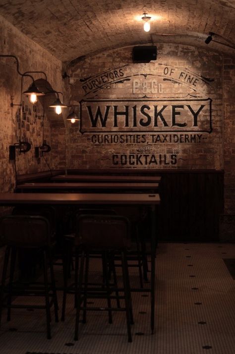 Warm lighting within the restaurant and bar area is a necessity to set the tone | City Lighting Products | www.facebook.com/CityLightingProducts Underground Hideout, Beard Styling, Bar Deco, Gentlemen Style, Pub Interior, Gold Bar Cart, Brick Background, Whisky Bar, Revere Pewter