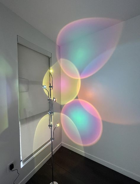 Sometimes a room just needs a chill vibe rather than harsh overhead lighting. This LED halo lamp gives a unique touch to any space. It comes with multiple colored disks so you can customize each bulb to shine a different hue or just have it be pure white light. Definitely a conversation starter. Halo Lamp, Overhead Lamp, Fancy Bedroom, Lighting For Bedroom, Corner Floor Lamp, Overhead Lighting, Mood Light, Color Filter, Color Chrome