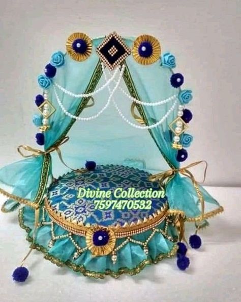 Laddu Gopal Singhasan 🩵 . . Size :- Customized accordingly Best for 4-6 number laddugopal/radharani 🤗 . . Idea and design exclusively only by @_divine_collection__ Get yours now🫶 . . DM to order or WhatsApp us on 7597470532 #janamashtami #krishnajanamashtami #laddugopal #krishna #krishnalove #krishnaconsciousness #singhasan #jhula #laddugopaljhula #rose #morpankh #morpankhdecor #peacockfeather #janamashtmicelebration #krishnadevotee #festivecollection #festivedecor #festivewear #festivals... Krishna Aasan Diy, Krishna Jhoola Diy, Krishna Aasan, Laddu Gopal Singhasan, Indian Wedding Gifts, Thali Decoration Ideas, Ganpati Decoration At Home, Janmashtami Decoration, Ganapati Decoration