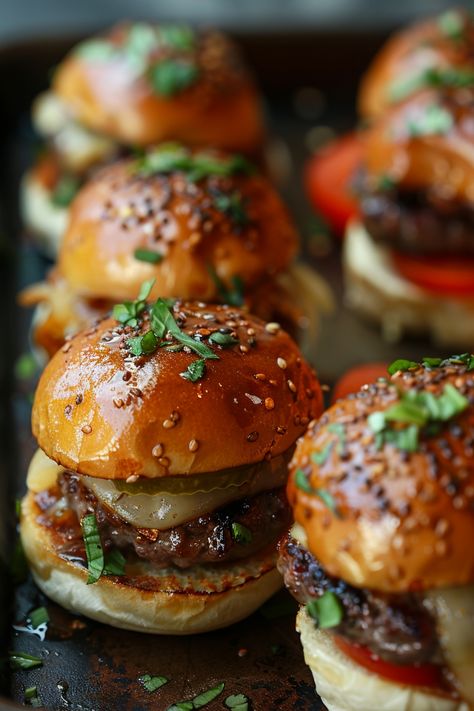 Sliders with sesame seed buns, melted cheese, and fresh herbs. Kids Party Meals, Mini Hamburgers Sliders, Fancy Buffet Food, Sliders Appetizers For Party, Sliders Buffet, Individual Appetizers For Party, Finger Food Dinner Party, Birthday Appetizer Ideas, Mini Quesadillas Appetizers