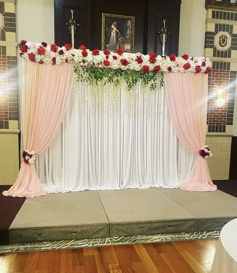 White floral backdrop with white and pink curtains White Floral Backdrop, Backdrop Draping, Curtain Backdrop, Red Drapes, Curtain Backdrops, Pink Backdrop, Pink Curtains, Floral Backdrop, Wedding 2024