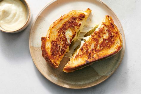 Toum Grilled Cheese  Recipe - NYT Cooking Aligot Recipe, Grilled Sandwich Recipes, Cottage Cheese Pasta, 2023 Recipes, Muenster Cheese, Vegetarian Comfort Food, Onion Jam, Grilled Cheese Recipes, Savoury Recipes