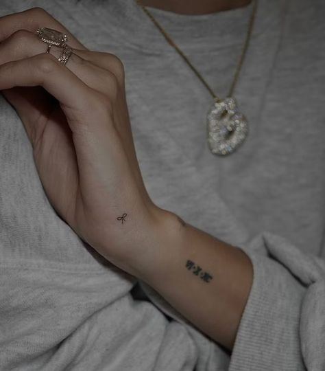 13 Coquette Tattoo Ideas Inspired By Hailey Bieber's Dainty Bow Iv Tattoo, Coquette Tattoo, Tattoo Lace, J Tattoo, G Tattoo, Cursive Tattoos, Ribbon Tattoos, Bow Tattoo, Petite Tattoos