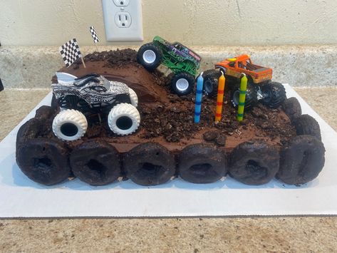 Monster Truck Track Cake, Monster Truck Bday Cake, Monster Truck And Dinosaur Cake, Blue Monster Truck Cake, Monster Jam Cupcakes Ideas, Young Wild And Three Monster Truck, Monster Truck Dirt Cake, Monster Jam Bday Party, Dinosaur Monster Truck Cake