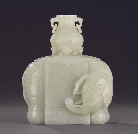 A FINELY CARVED WHITE JADE ELEPHANT Jade Elephant, Chinese Jade, Animal Masks, Chinese Ceramics, White Jade, Jade Carving, Four Square, Jade, Elephant