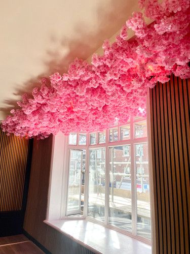 Pink cherry blossom ceiling installation Cherry Blossom Ceiling, Outdoor Couch Diy, Layered Window Treatments, Romantic Room Decoration, Flower Ceiling, Floral Installations, Couch Diy, Romantic Room, Pink Cherry Blossom