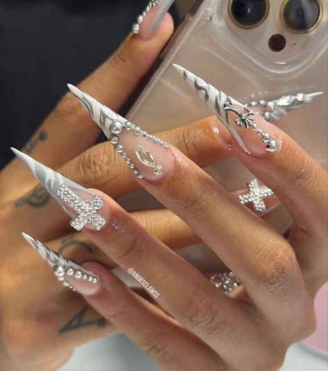 Exotic Stiletto Nails, Xl Stilleto Acrylic Nails, Stiletto Nails White, Silver French Tip Nails Stilleto, Long White Sharp Nails, Silver Stilettos Nails, Stiletto Nails Charms, Black And Silver Stiletto Nails, Bling Stiletto Nails