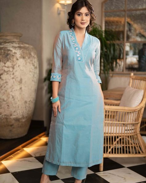 Elevate your wardrobe with this stunning Firozi Blue Chanderi Pant & Kurta set. Delicately adorned with intricate glass beadwork on the neckline and sleeves, this outfit exudes elegance. Made from high-quality Chanderi fabric, the set promises both comfort and style. Bonus: Dupatta is optional for versatile styling. #sujatra #sujatraglobal #sujatrakurtis #chanderikurti #kurtapantset #chanderipants #gladsbeadwork #beadwork #chanderisilk #festivewear #occasionwear Chanderi Kurta Designs, Churidar Neck Designs, Ethnic Suit, Suit Salwar, Kurtis With Pants, Everyday Fashion Outfits, Indian Designer Outfits, Kurta With Pants, Kurta Designs