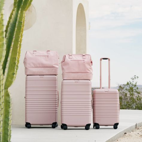 - Cosmopolitan.com Rich Wife Lifestyle, Pink Suitcase, Hard Case Luggage, Pink Luggage, Small Luggage, Hard Shell Luggage, Spinning Wheels, Pink Day, Suitcase Bag