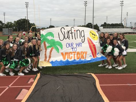 Beach Theme run through Bikers Vs Surfers Football Theme, Ocean Theme Spirit Week, Beach Themed Student Section Football, Beach Theme Run Through Sign Football, Beach Homecoming Float, We Run This Beach Football Poster, Tropical Pep Rally, Beach Themed Football Posters, Beach Theme Football Game Posters