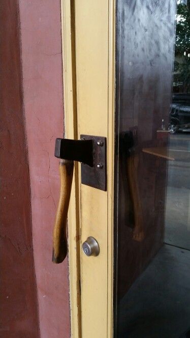 Restaurant door handle in charming Murphys California Fire House Decor, Murphys California, Tool Display, Custom Door Handle, Restaurant Door, Old Door Knobs, Door Handle Design, Public Space Design, Shop Doors