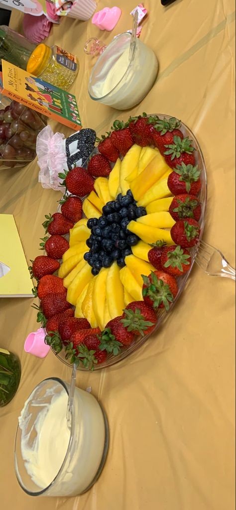 Blueberry, mango, and strawberries with cream cheese dip on the side. Sunflower Cheese Tray, Strawberries With Cream, Blueberry Mango, Meat And Cheese Tray, Sunflower Baby Shower, Cream Cheese Dip, Ladybug Baby Shower, Sunflower Baby Showers, Cream Cheese Dips