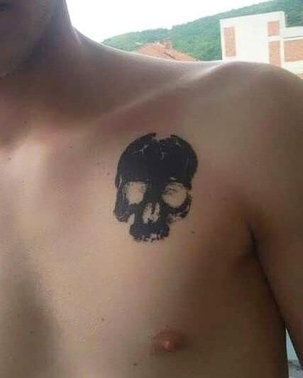 Small Skull Tattoo Mens Emo Tattoos, Y2k Skull Tattoo, Skull Belly Tattoo, Shaded Skull Tattoo, Stick And Poke Tattoo Men, Front Chest Tattoo, Emo Tattoos For Guys, Tattoo Designs Men Chest, Sick Tattoos For Guys