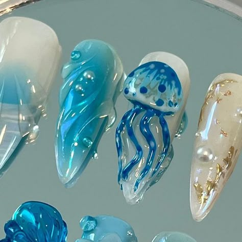 Sam | Press On Nail Artist ☆⋆｡𖦹°‧★ on Instagram: "Ocean themed freestyle set 🩵🏝️🪼🌼 . . . #pressonnails #oceannails #summernails #jellynails #longstilettonails #jellynails #flowernails #pearlnails #bluenails #waternails" 3d Ocean Nails, Sealife Nails, Sea Animal Nails, Artistic Nails Design, Ocean Theme Nails, Underwater Nails, Ocean Themed Nails, Jellyfish Nails, Nails Ocean